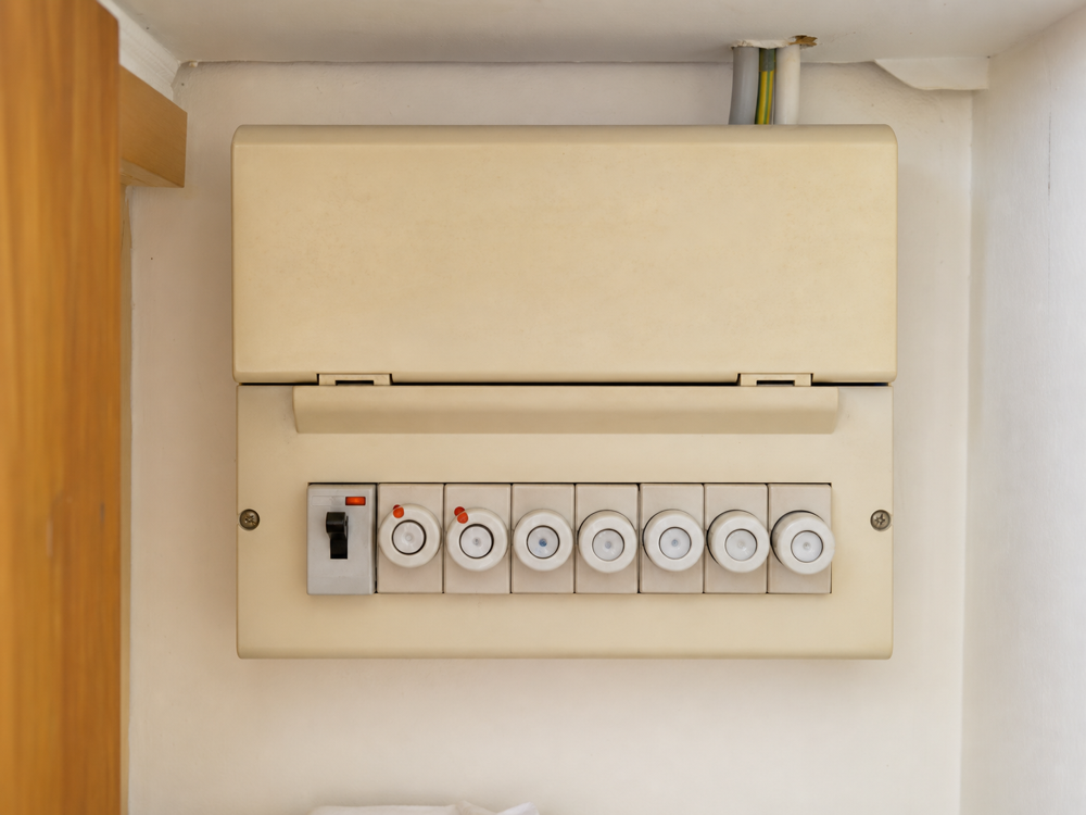 Before: Old fuse board to fully certified consumer unit, Islington