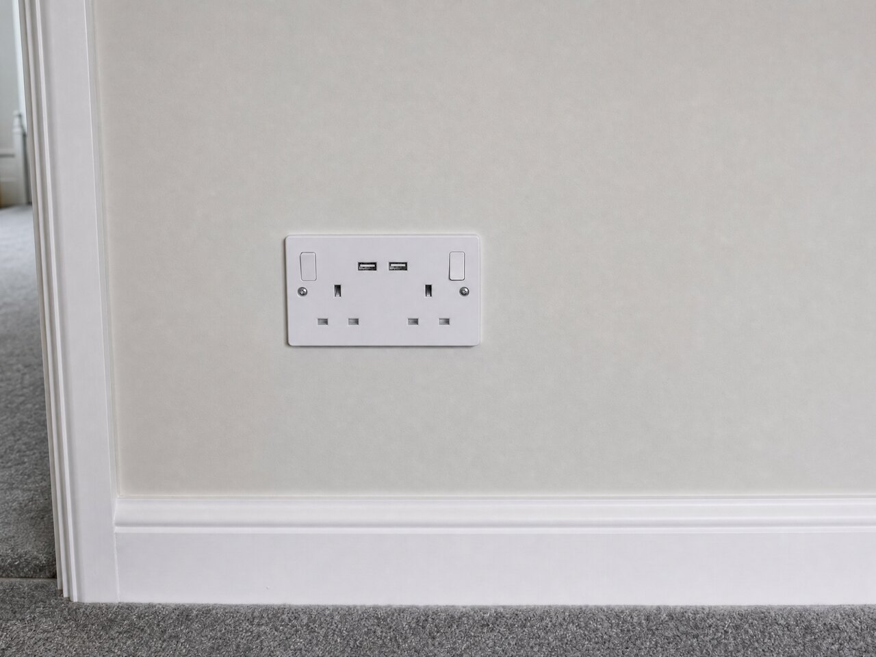After: Worn sockets to flush brushed-metal accessories, London