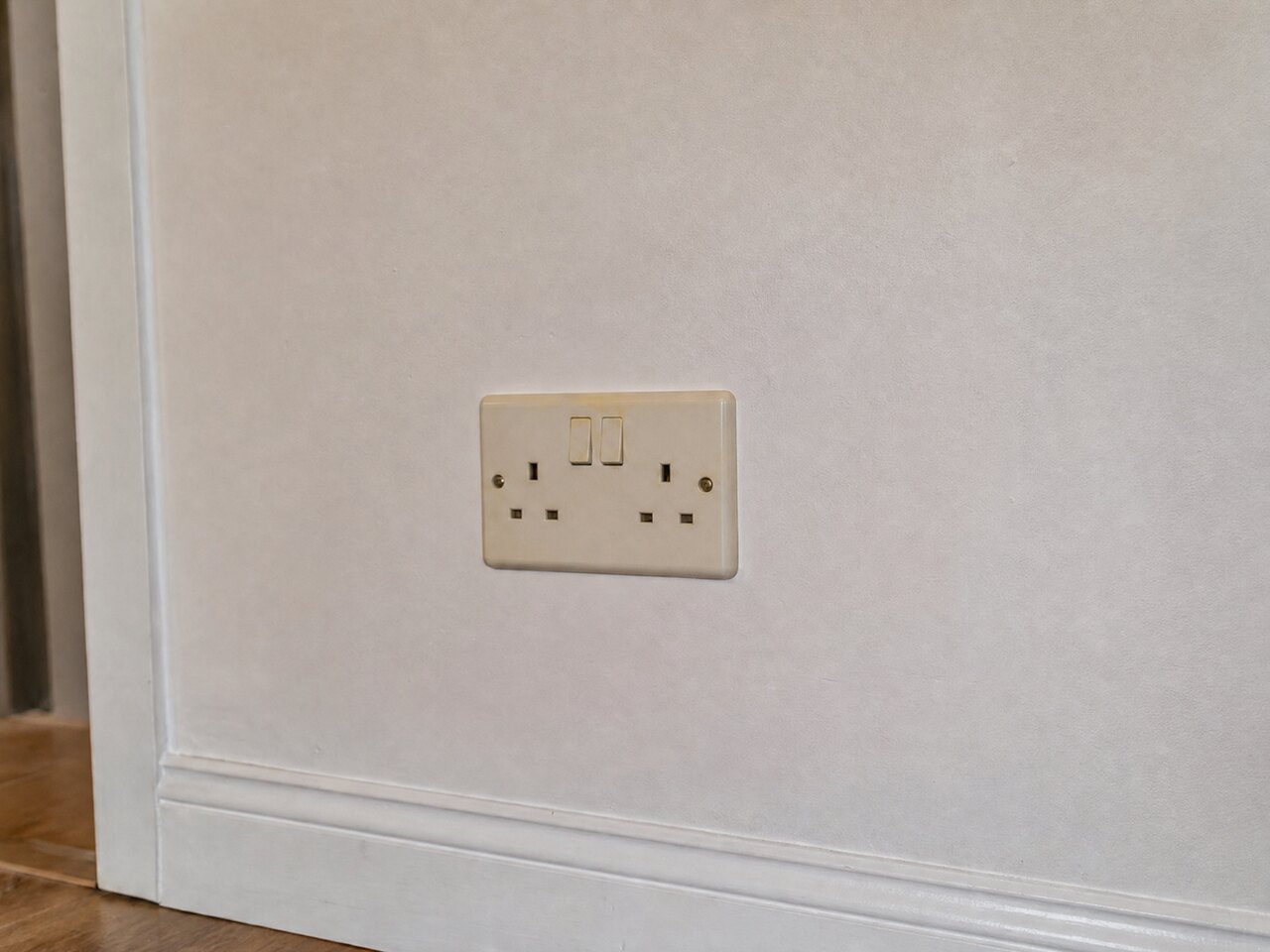 Before: Worn sockets to flush brushed-metal accessories, London