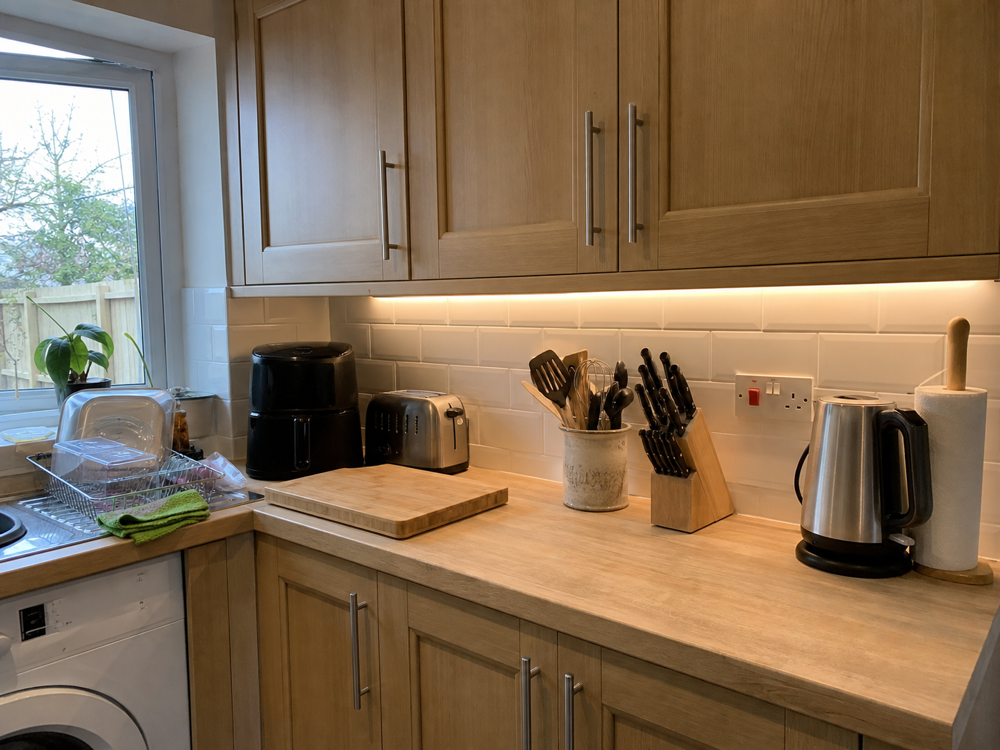 After: Dated kitchen wiring to under-cabinet LED, Wandsworth
