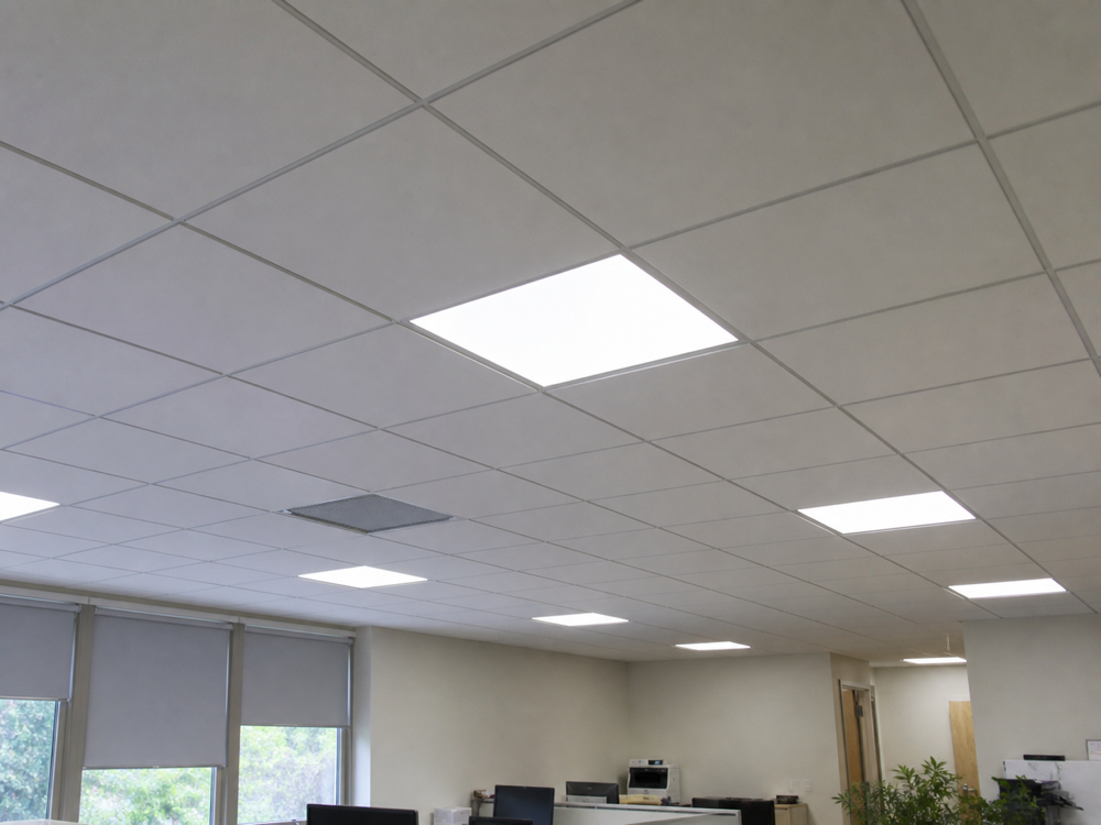 After: Old fluorescent strips to clean panel lighting, City of London